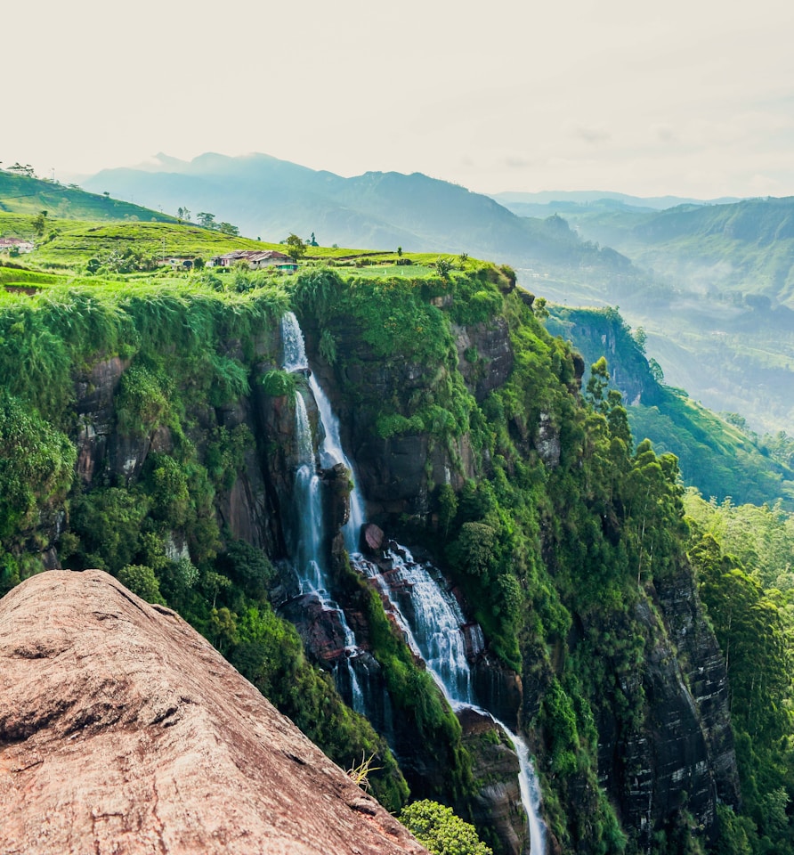 Waterfall flowing through the mountains